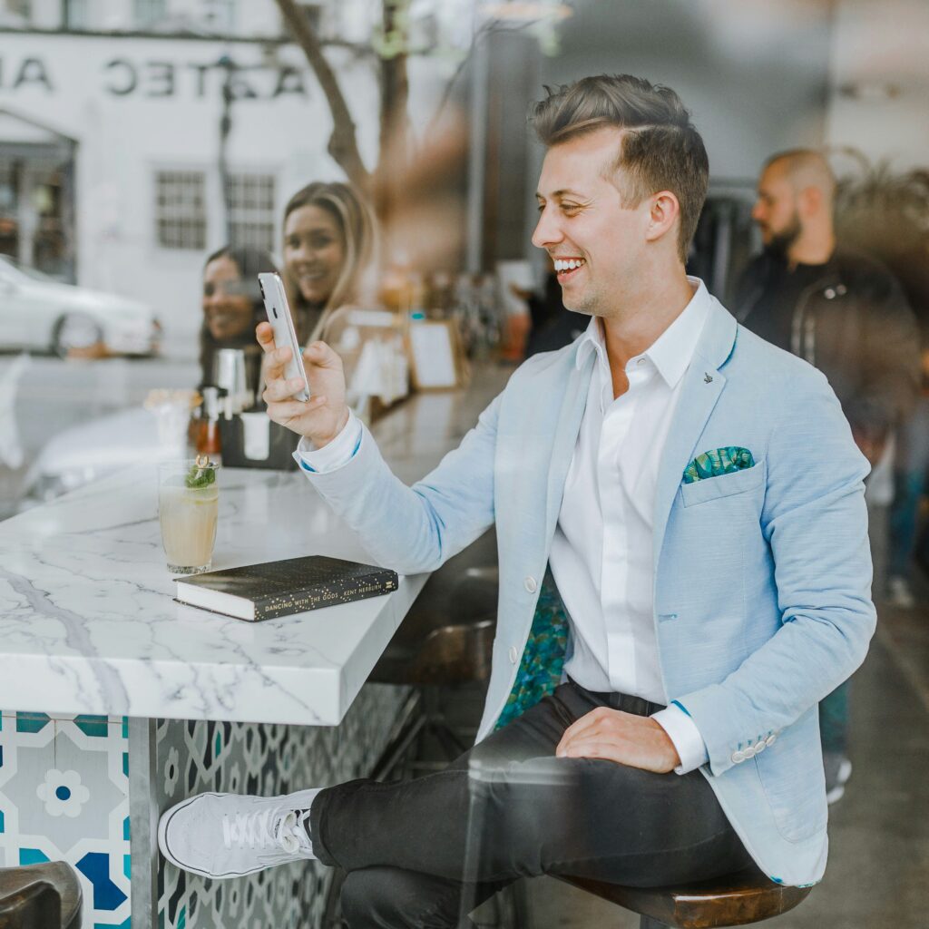 Entrepreneur celebrating success after using AI tools for business growth