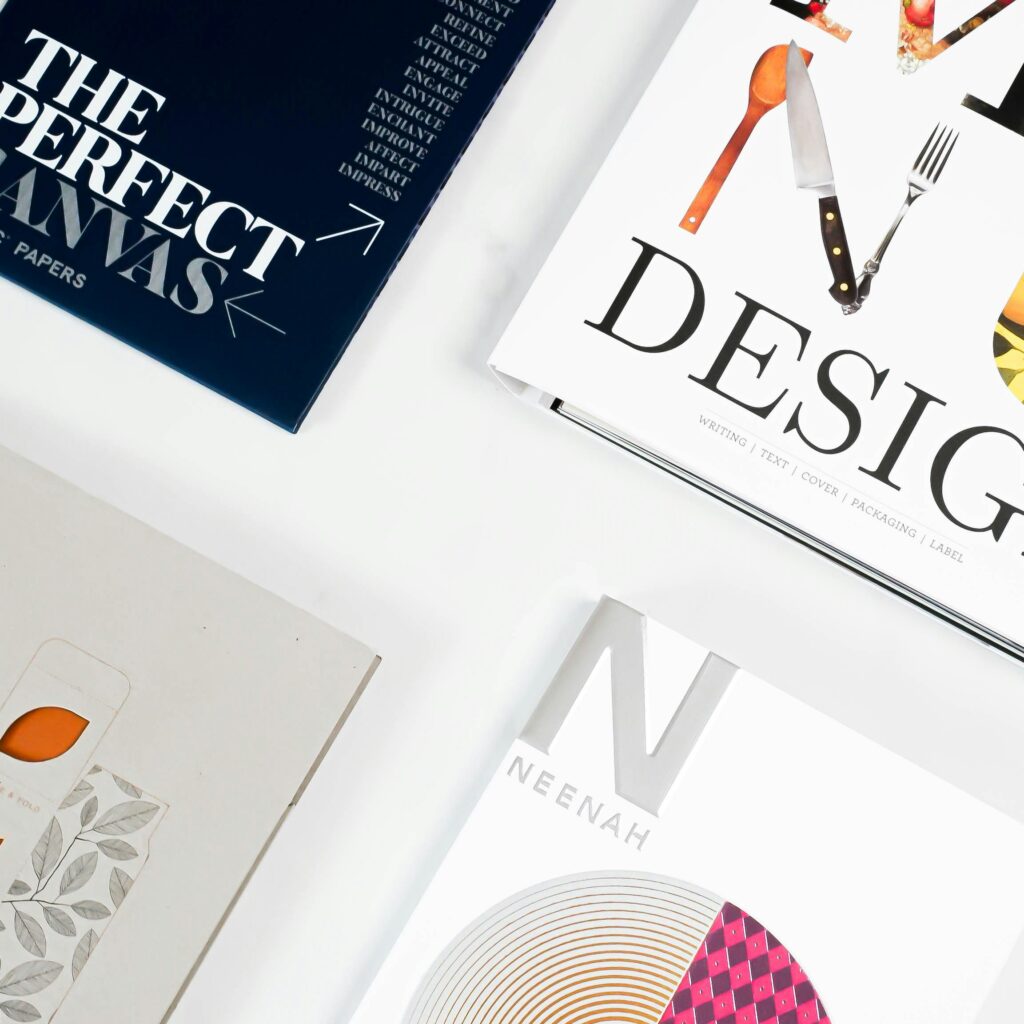 Flat lay of color palette, typography, and logo sketches