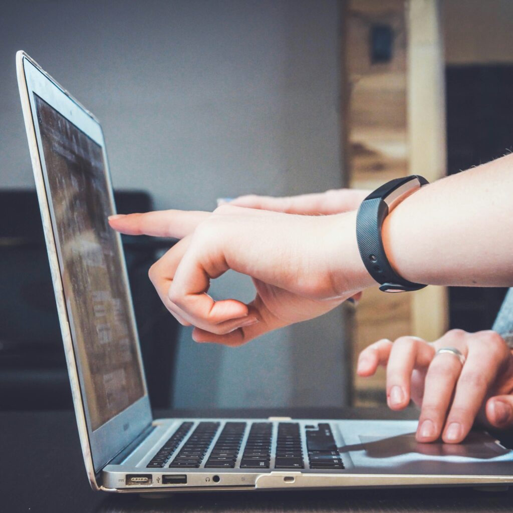 Entrepreneur building a website using drag-and-drop tools